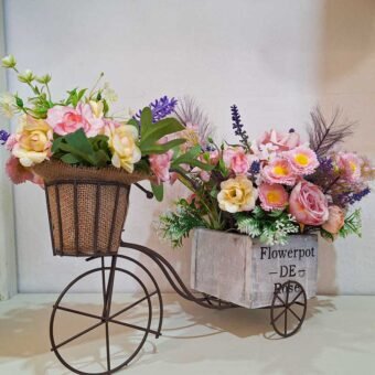 Triciclo con arreglo floral
